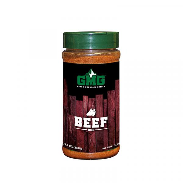 Container of Green Mountain Grills Beef Rub, featuring a black label with white text and a green lid, set against a wooden background.