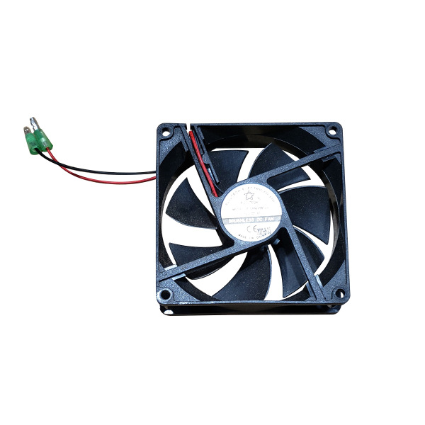 Combustion fan for TREK/DC grill model, featuring a black square housing and visible wiring, essential for maintaining optimal grill performance.